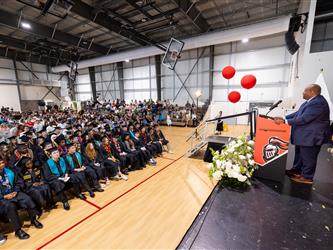 superintendent speaking at podium 