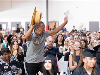 board member waving bye