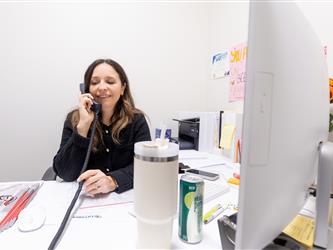 student picking up phone 