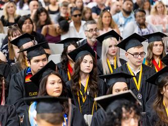 group of grads in front row 