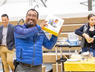 man posing with gift