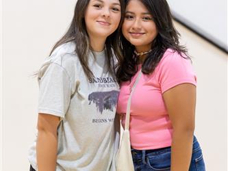 two students posing with each other