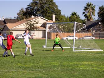 Student kicks a goal