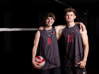 Volleyball teammates posing