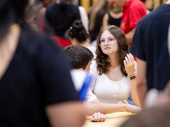 student sitting at table 