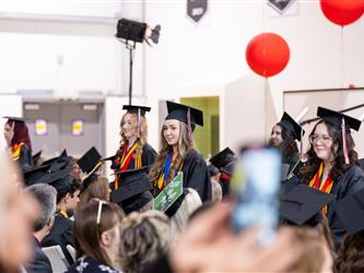 aisle shot of grad class