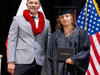 futures principal posing with graduating student