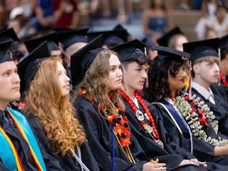 students walking to stage