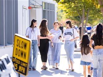 students walking on campus 