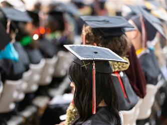 student walking towards stage