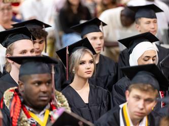 group of grads in front row 