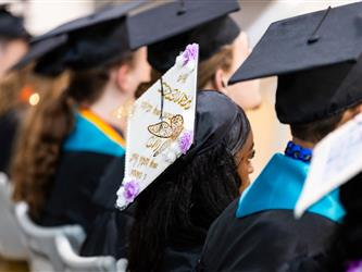 students walking to stage