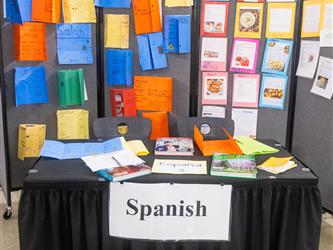 A table display depicting the Spanish language and culture